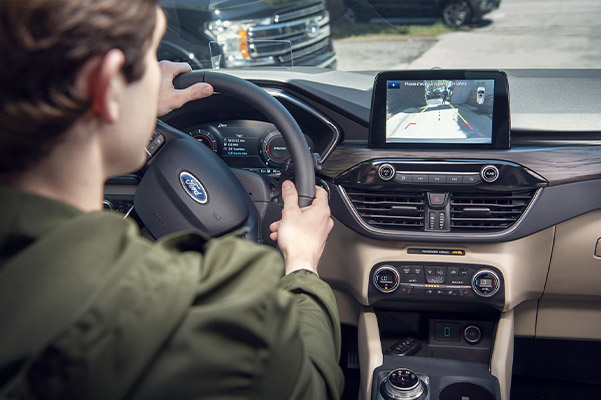 interio view of Ford Escape crossover showcasing rear view camera on the digital display 