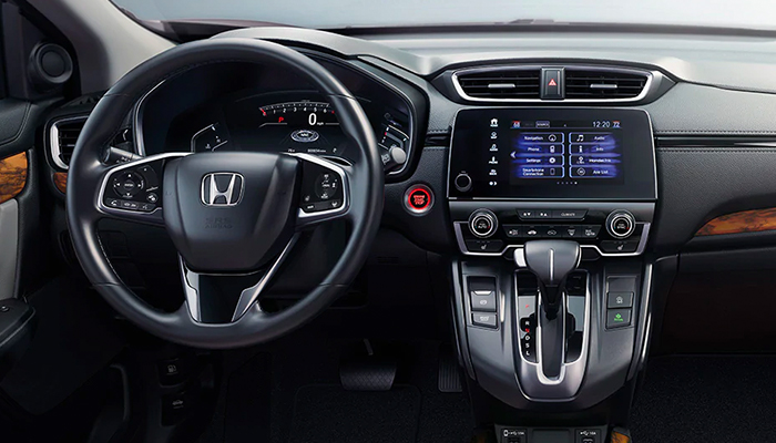 The cockpit features premium materials and conveniences, including dual-zone automatic climate control for a more comfortable ride.