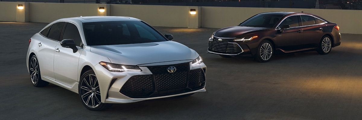 Two 2020 Toyota Avalons parked in a parking lot