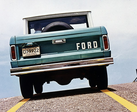 1967 Ford Bronco Pickup in Holly Green with a metal roof painted Wimbledon White.