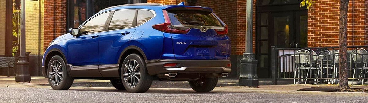 blue 2021 honda cr-v rear view on the street