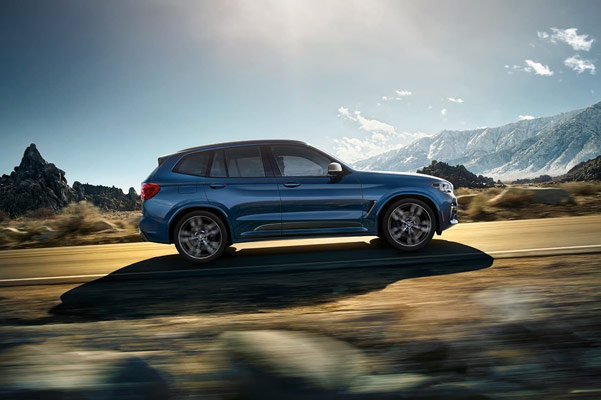 interior view of BMW x3 suv showcasing white leather seats