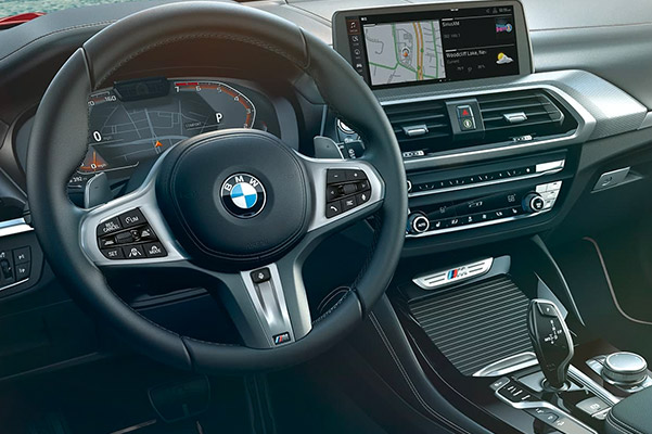 interior shot of BMW X4 Sav featuring driver dashboard and digitak screen