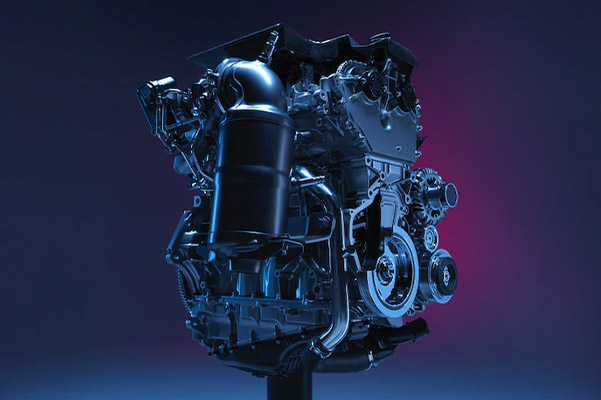 close up of turbo charged engine of 2021 Cadillac XT4 against a dark background