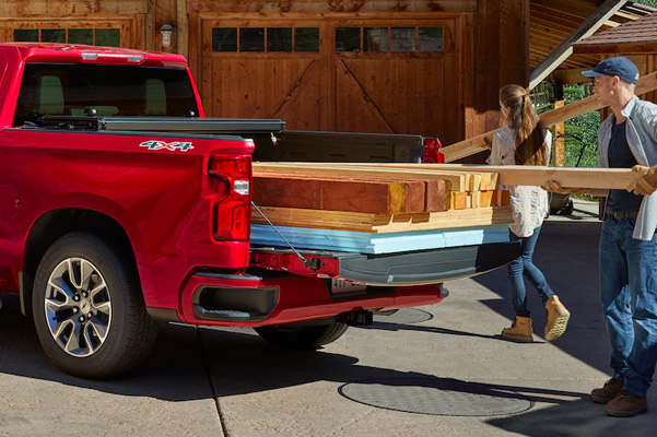 2021 Chevy Silverado 1500 being loaded with lumber