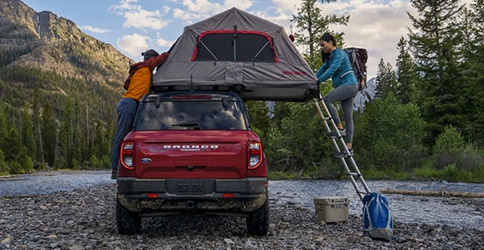 2021 Ford Bronco Sport with tent being set up on rooftop