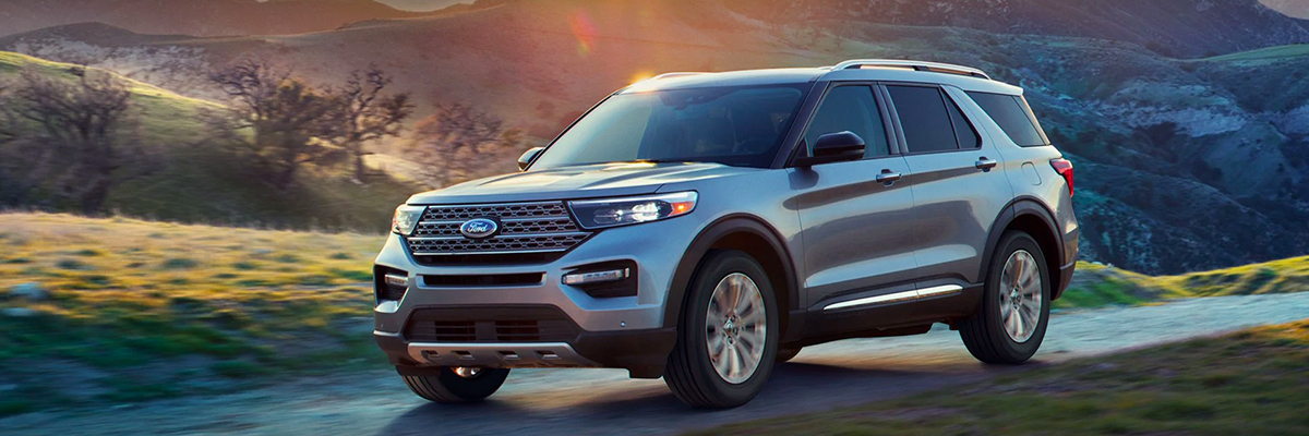 2021 ford explorer driving down a gravel road