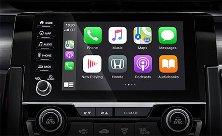 close up of honda civic hatchback digital screen showcasing apple play connectivity capabilities