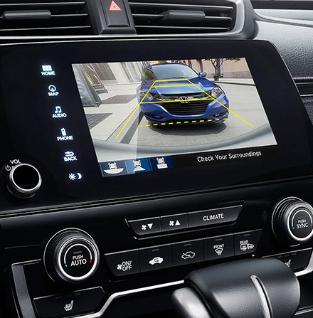 Display Audio touch-screen detail in the 2021 Honda CR-V Touring shown with Black Leather.