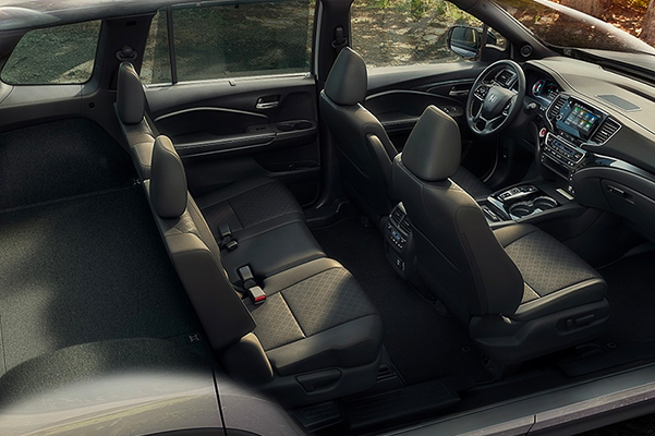 Full interior shot of the 2021 Honda Passport Elite with Black Leather displaying spacious interior and cargo capacity.