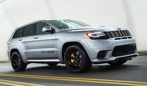 he 2021 Jeep Grand Cherokee driving high speed.