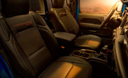 The front-row seats in the 2021 Jeep Wrangler Rubicon 392, sporting Rubicon 392 embroidery on the backrests.