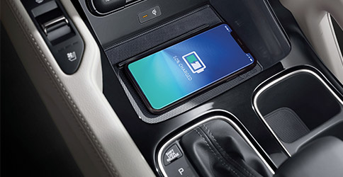 phone wirelessly charging in the car