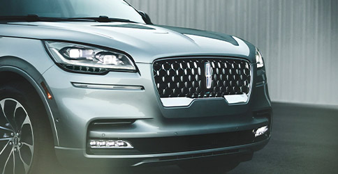 The bold front grille and headlamps show off the available Illumination Package