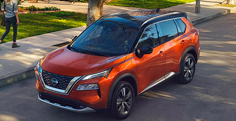 Orange Nissan Rogue SUV