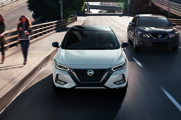 Front view of 2021 Nissan Sentras driving side by side
