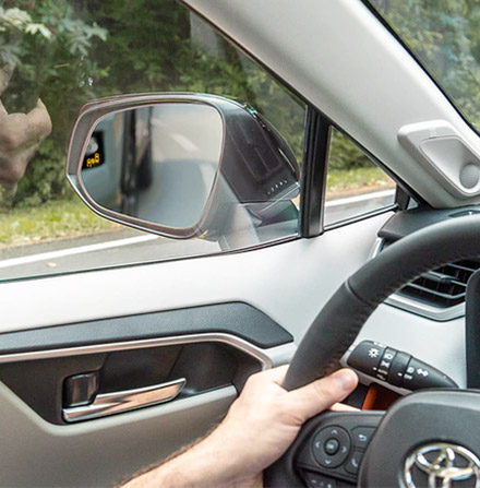 detail shot of 2021 toyota rav4 hybrid blind spot monitor