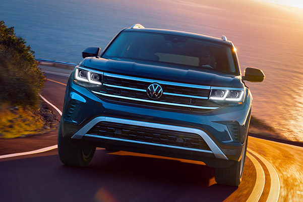 2021 VW Atlas driving in the sunset