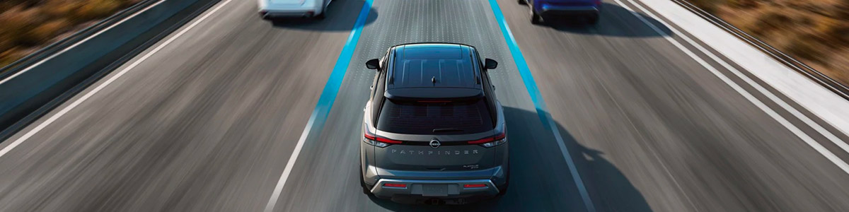 aerial view of 2022 nissan pathfinder suv on the road showcasing pro pilot asssit feature.
