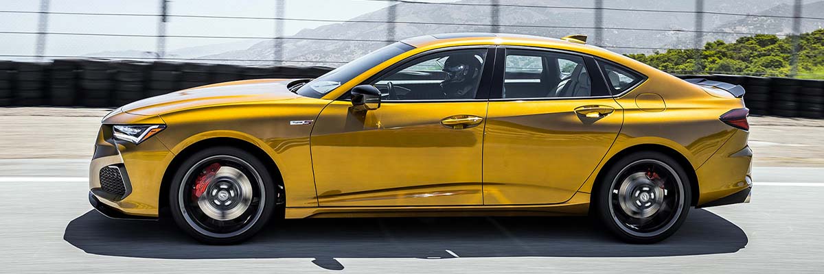 TLX 2022 Tiger Eye Pearl premium paint accentuates the aggressive and aerodynamic design