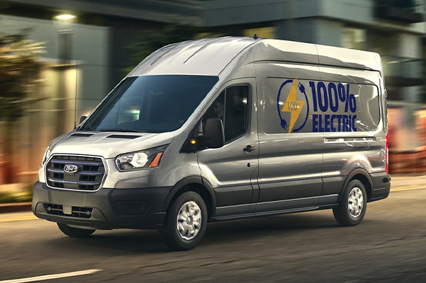 A 2022 Ford E-Transit being driven in a city environment
