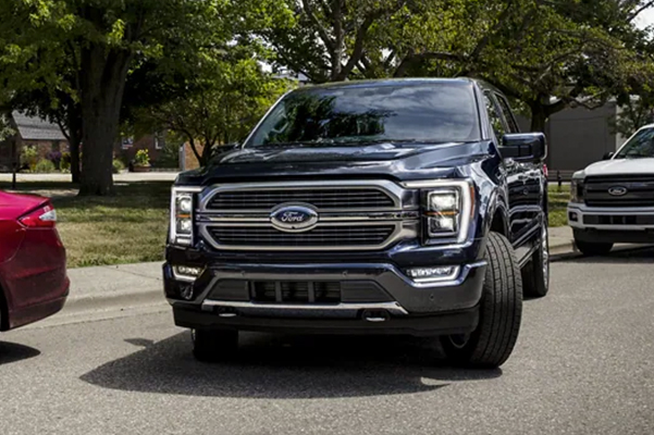 A 2022 Ford F-150 being parallel parked