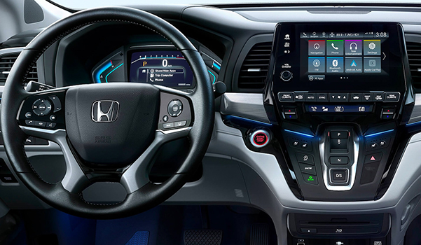 Interior rear close-up view of steering wheel and dash in the 2022 Honda Odyssey Elite with Gray Leather.