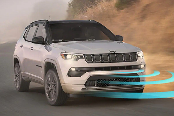 The 2022 Jeep Compass High Altitude with an illustrated sensor field emanating from the front of the vehicle.