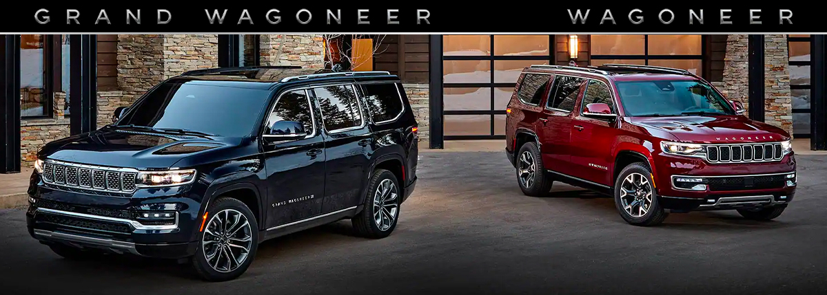 The 2022 Jeep Grand WAGONEER and 2022 Jeep WAGONEER parked in a residential driveway.