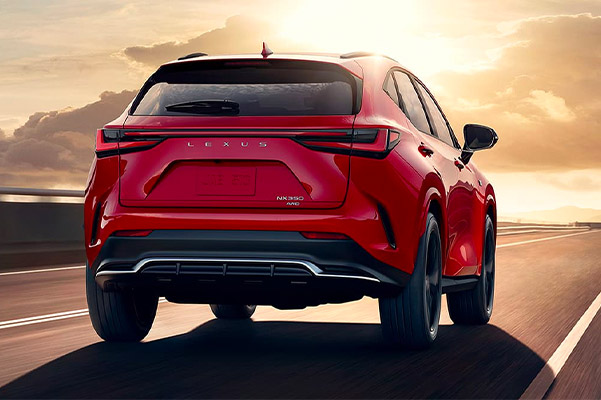 rear view of a 2022 lexus NX driving down the road