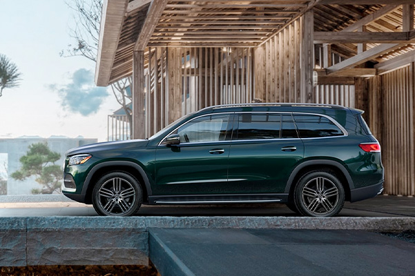 2022 GLS SUV side view in emerald green