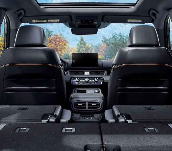 Rear interior cargo-area view of the 2023 Honda Pilot TrailSport in Crystal Black Pearl.