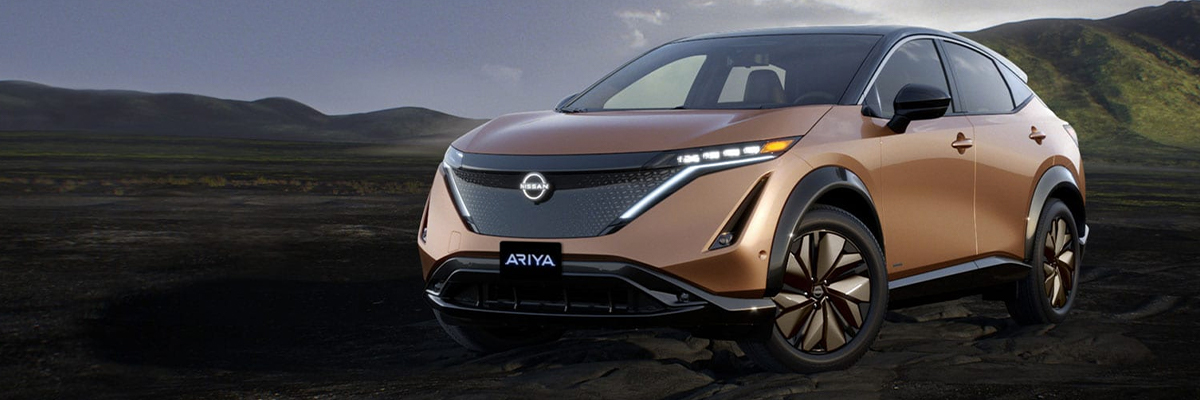 2023 Nissan ARIYA with a mountainscape in the background