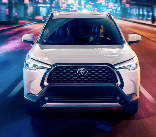 Front view of the 2023 Toyota Corolla Cross XLE shown in Wind Chill Pearl