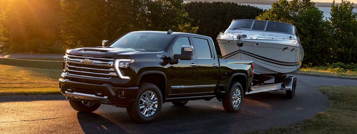 2024 Chevy Silverado HD towing a boat