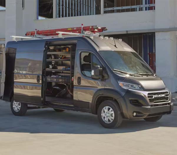 2024 Ram Promaster parked outside a construction building