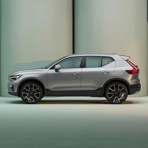 The side profile of a silver Volvo XC40 SUV.