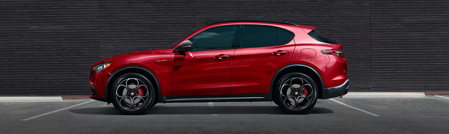 Side profile view of a 2025 Alfa Romeo Stelvio parked