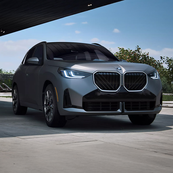 Exterior view of the 2025 BMW X3 parked in the shade