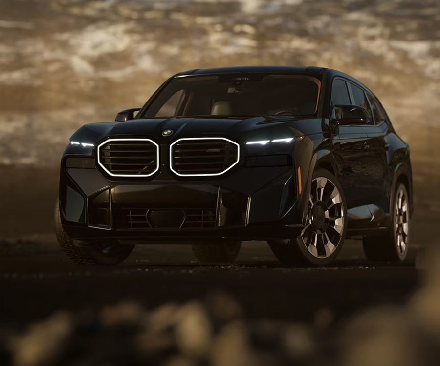 2025 BMW XM in a futuristic desert-like landscape
