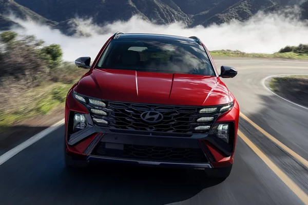 2025 Tucson Hybrid front shot - driving