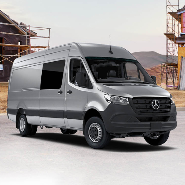 Sprinter Passenger Van parked outside a construction site