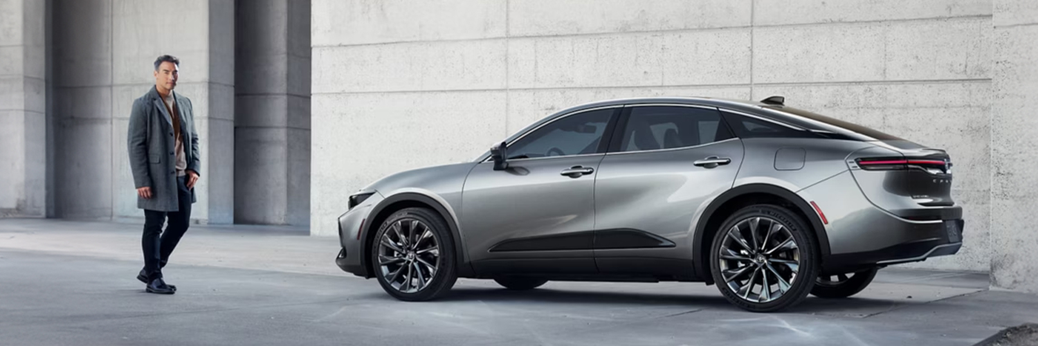Man standing beside a 2025 Toyota Crown