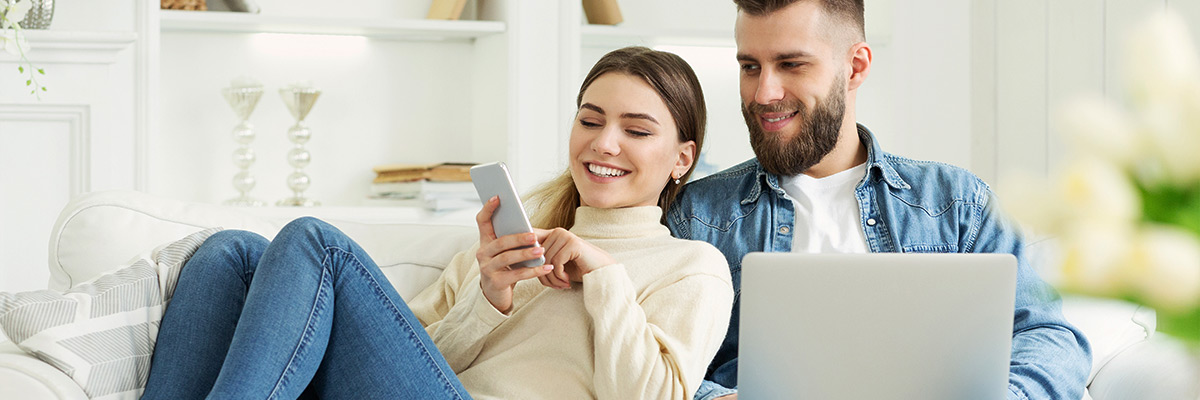 happy couple shopping online