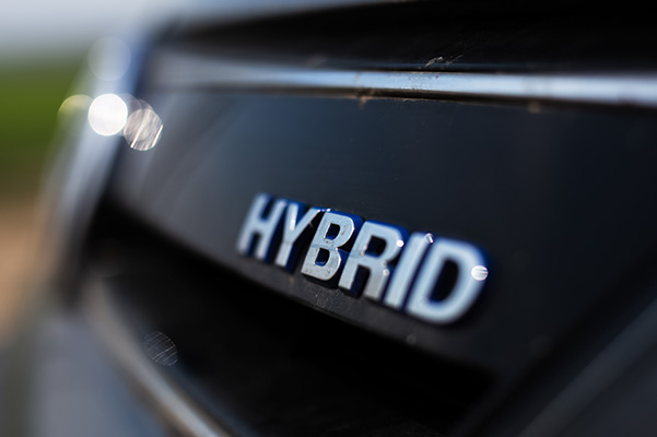 Hybrid car badge closeup