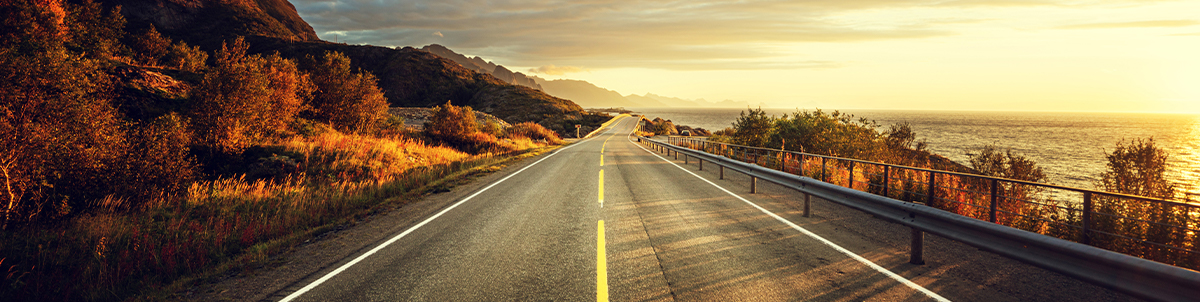 road by the sea in sunrise time