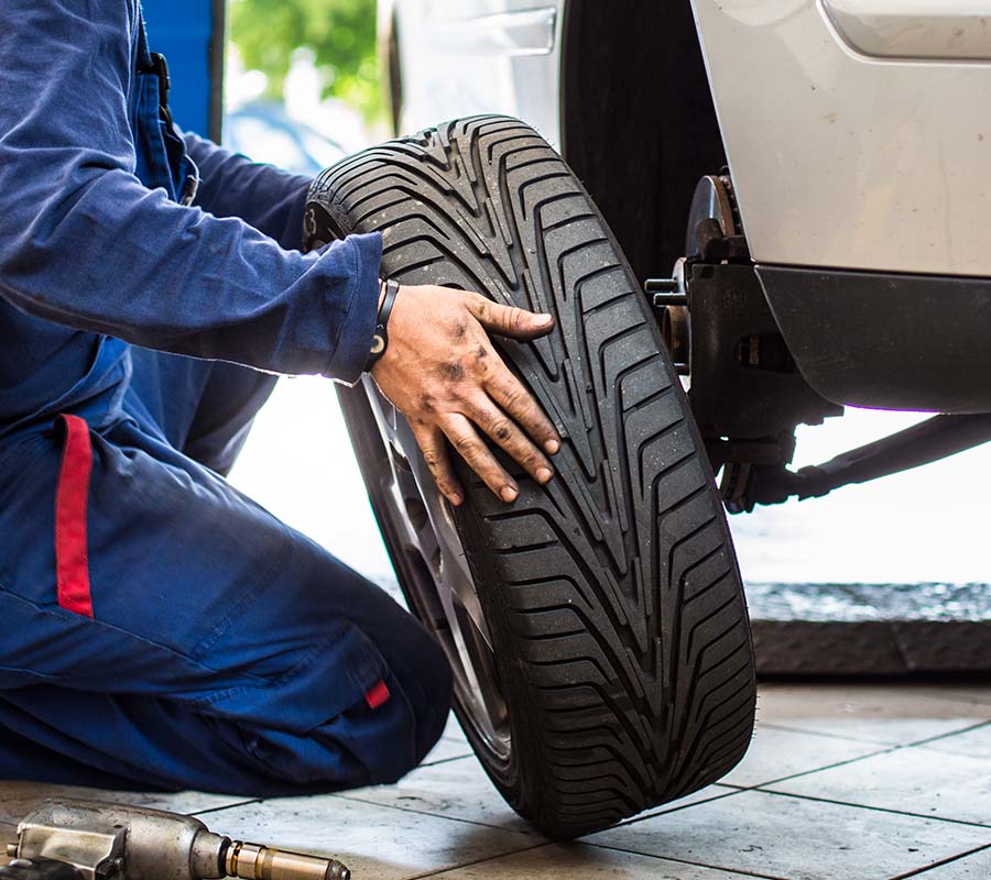 Service tech changing tires