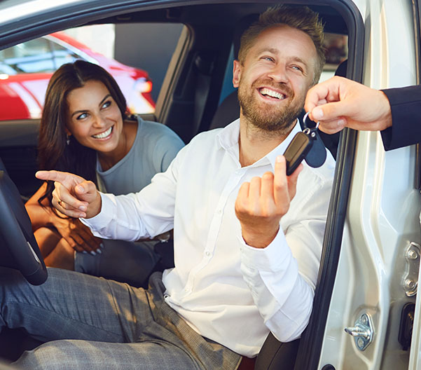 Happy customer with their car keys